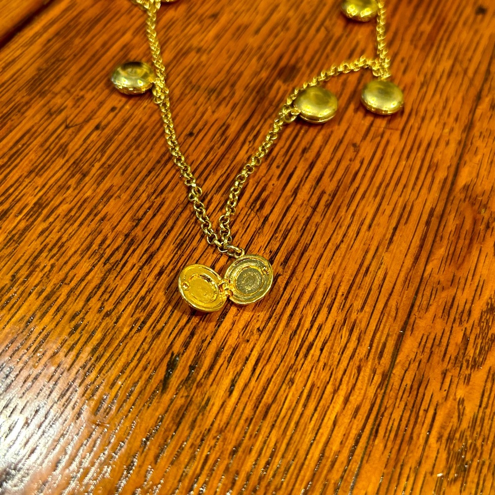 J Crew 34 inch gold chain with 8 small lockets hanging individually on chain!